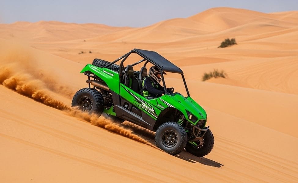 Combo Package Camel Ride, Falcon Photo & Dune Buggy Green dune buggy on Dubai desert dunes, featured in a combo tour that includes a camel ride and falcon photo session - Combo Package Camel Ride, Falcon Photo & Dune Buggy